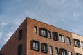 Brick wall of modern building facade, office or residential house Royalty Free Stock Photo