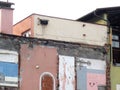 Brick building under demolition.