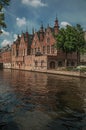 Brick buildings on the canal in a sunny day at Bruges Royalty Free Stock Photo