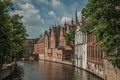 Brick buildings on the canal in a sunny day at Bruges Royalty Free Stock Photo