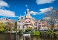 Brick buildings at the edge of canals in Amsterdam