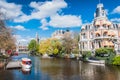 Brick buildings at the edge of canals in Amsterdam