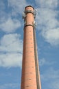 Brick chimney with antenna cellular systems Royalty Free Stock Photo