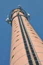 Brick chimney with antenna cellular systems Royalty Free Stock Photo