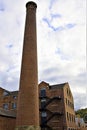 Brick chimney stack in Saltaire POV1, Saltaire, Shipley, Bradford, West Yorkshire. Royalty Free Stock Photo