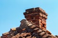 Old brick chimney on the roof Royalty Free Stock Photo