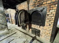 AUSCHWITZ, POLAND - SEPTEMBER 2, 2017. The brick crematory inside a building of Auschwitz concentration camp, Auschwitz, Poland Royalty Free Stock Photo