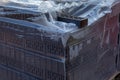 Brick face ceramic hollow single in a pallet covered with a plastic film Royalty Free Stock Photo