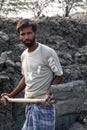 Brick field. Laborers are carrying deposited soil for making raw brick in Sarberia, India Royalty Free Stock Photo