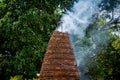Brick firecracker oven in a big buddhist temple in Thailand Royalty Free Stock Photo