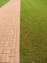 Brick footpath next to grass