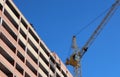 Brick building under construction crane construction site workers Royalty Free Stock Photo