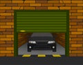 Brick garage with sectional doors open in perspective with the car inside