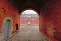 Brick gate to Stavelot abbey on a cloudy day Royalty Free Stock Photo