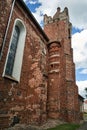 The brick, historic, gothic parish church of St. Nativity of the Blessed Virgin Mary in the village of Kamionna
