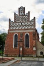 The brick, historic, gothic parish church of St. Nativity of the Blessed Virgin Mary in the village of Kamionna