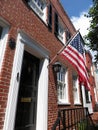 Brick Home With American Flag Royalty Free Stock Photo