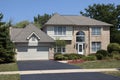 Brick home with arched front windows Royalty Free Stock Photo