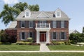 Brick home with front balcony Royalty Free Stock Photo