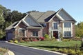 Brick home with front balcony Royalty Free Stock Photo