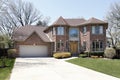 Brick home with stone entryway Royalty Free Stock Photo