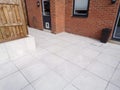 Brick home with tiled patio