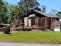 Brick house being slowly demolished