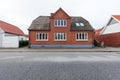 Brick house in Denmark on the road Royalty Free Stock Photo