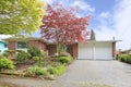 Brick house with entrance porch and garage view Royalty Free Stock Photo