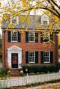 Brick house and fall foliage in Alexandria, Virginia Royalty Free Stock Photo