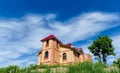 Brick house on top of the hill. Royalty Free Stock Photo