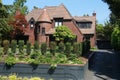 Brick house with turret in affluent neighborhood