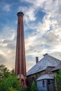 Brick Industrial Smokestack Against Dramatic Sky Royalty Free Stock Photo