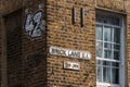 Brick Lane Street Name Sign on brick wall in London