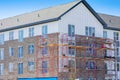 Brick-Layers Scaffolding Around New Multi-Story Apartment Building Project