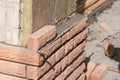 Brick laying on top of a mineral insulation