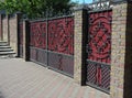 Brick and Metal Fence with Door and Gate of Modern Style Design Decorative Cracked Brick Wall Royalty Free Stock Photo