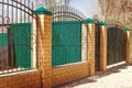 Brick and Metal Fence with Door and Gate of Modern Style Design Metal Fence Ideas Royalty Free Stock Photo