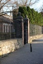 Fence made of bricks and metal wire Royalty Free Stock Photo