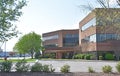 Brick Modern Office Building and Parking Lot Royalty Free Stock Photo