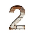 Brick number two, 2 on the background of an old brick wall with peeled paint. Decorative font from old brickwork Royalty Free Stock Photo