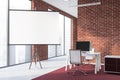 Brick office interior with projector screen Royalty Free Stock Photo