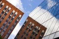 Old and New. Brick and Glass Office Building. Royalty Free Stock Photo