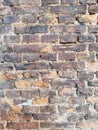 Brick. Old, crumbling brick wall with a beautiful porous and rough structure.