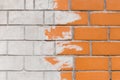 Brick old urban wall in orange light brown white paint abstract brush design pattern street texture background Royalty Free Stock Photo