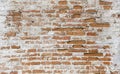 Master. Brick old wall. Cleaned plaster. Red brick. Brick wall of old bricks. Build houses. Royalty Free Stock Photo