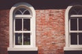 Brick outer wall and white window