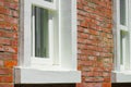 Brick outer wall and white window