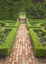 Brick pathway in formal garden Royalty Free Stock Photo