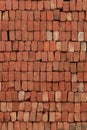 Brick Pattern. Stack of fresh processed bricks loosely stacked horizontally